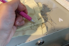marking the alterations on the other half of the corset
